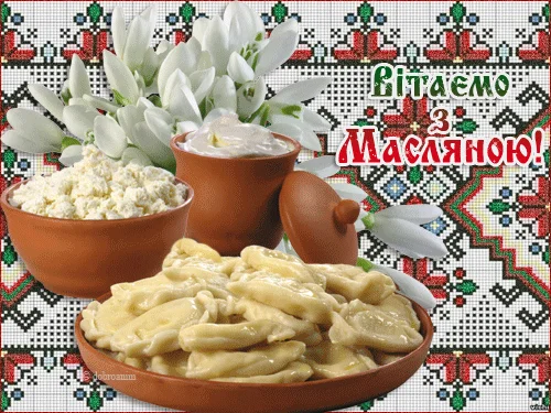 Традиційні страви та квіти на Масляну.